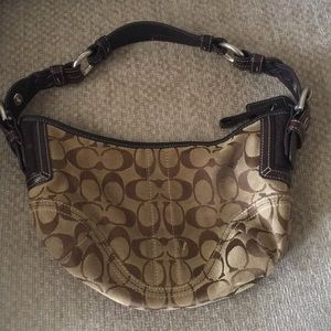 Lightly used women’s Coach handbag.